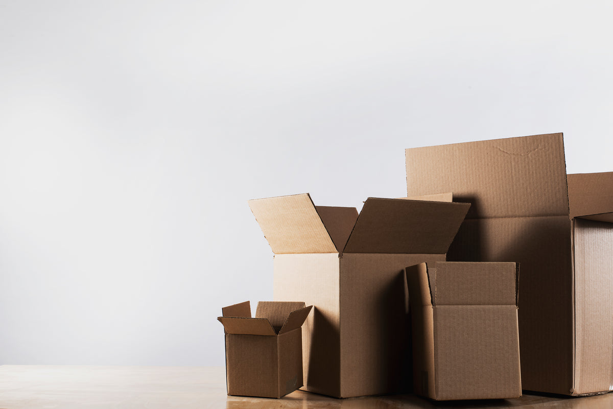 Empty shipping boxes ready to be packed on a table